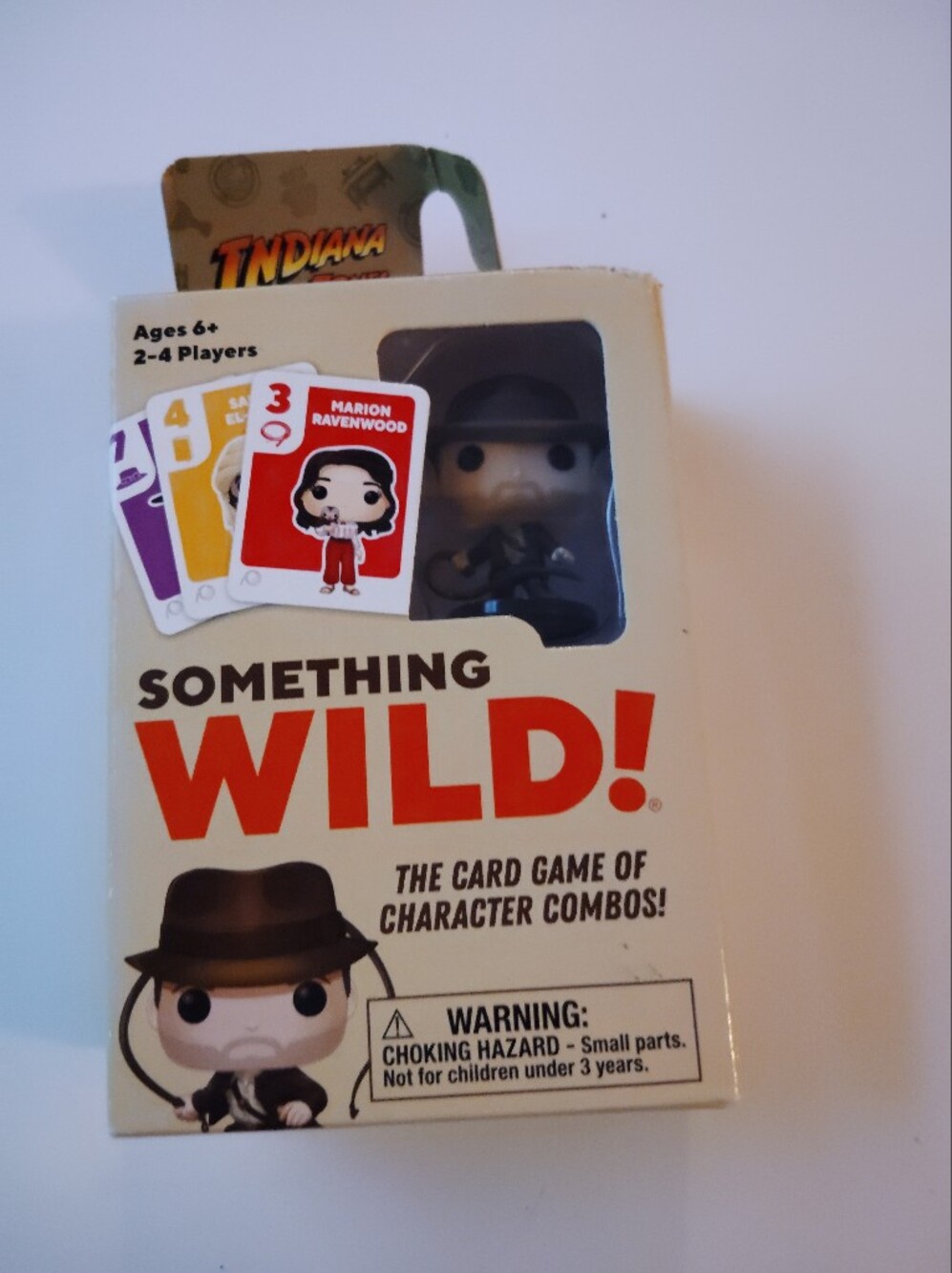 Something Wild! Card Game with Collectible Figure - Red, Black, White